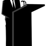 Businessman_silhouette_podium